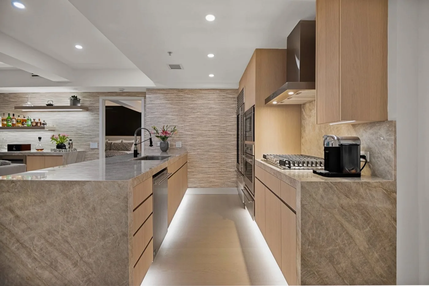 Custom kitchen with stone and wood cabinetry